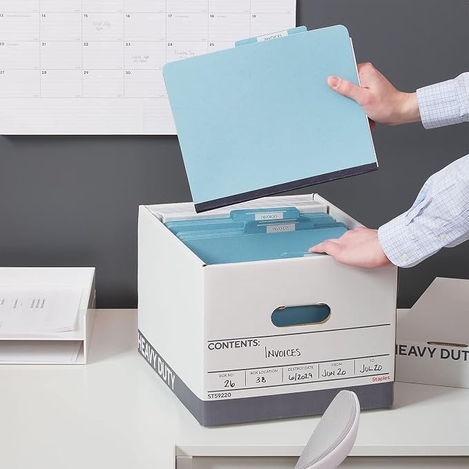 Staples Triple Wall Heavy Duty File Box, Lift-Off Lid, 12/Carton | White/gray boxes for letter or legal documents in bulk storage settings.