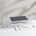 Russell+Hazel Acrylic Monitor Stand with Storage Drawer, Clear | Lifts your monitor for better posture and hides clutter below. Clear acrylic riser with a storage drawer holds up to 10 lbs.
