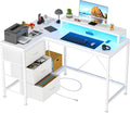 Hetoy L-Shaped Gaming Desk with Power Outlets, Corner Desk with Drawers, Shelves & LED Lights, Computer Desk for Home & Office