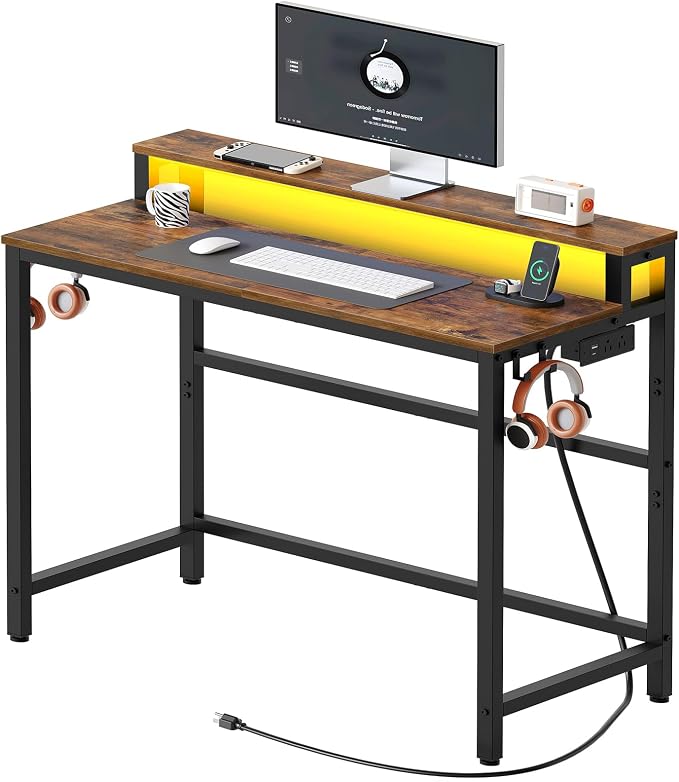 Small Computer Desk with Charging Station and LED Lights, Gaming Desk with Monitor Stand, 2-Tier Home Office Desk with 4 Side Hooks, for Living Room, Home Office, Rustic Brown DN01UDBRY2