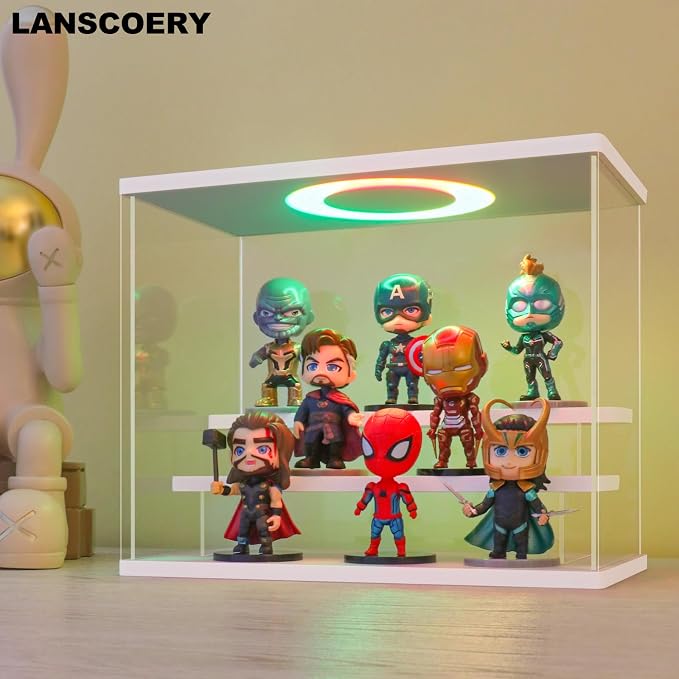 LANSCOERY Acrylic Display Case with RGBW Lights, 3 Tier White | 11.8 x 6.3 x 9.4 in case displays small figures on desks or shelves with tiered rows and front access.