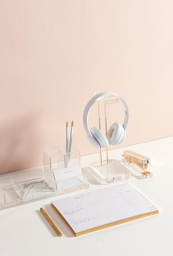 russell+hazel Acrylic Headphone Stand with Gold Hardware, Clear | Displays and stores headphones on a crystal-clear acrylic stand. Gold-toned hardware & polished edges dress up any workspace.