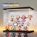 LANSCOERY Acrylic Display Case for Collectibles, 3-Tier LED Light, Black | 3mm clear acrylic panels with front door access and tri-color top light for small figures on a desk or shelf.