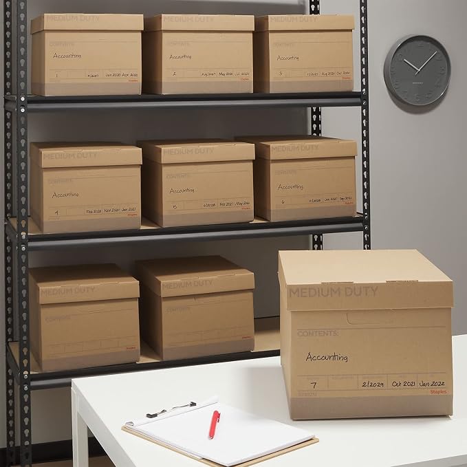 Staples Medium-Duty 100% Recycled Storage Boxes, Letter/Legal, 12-Pack | Eco-friendly stackable boxes for document storage in offices.
