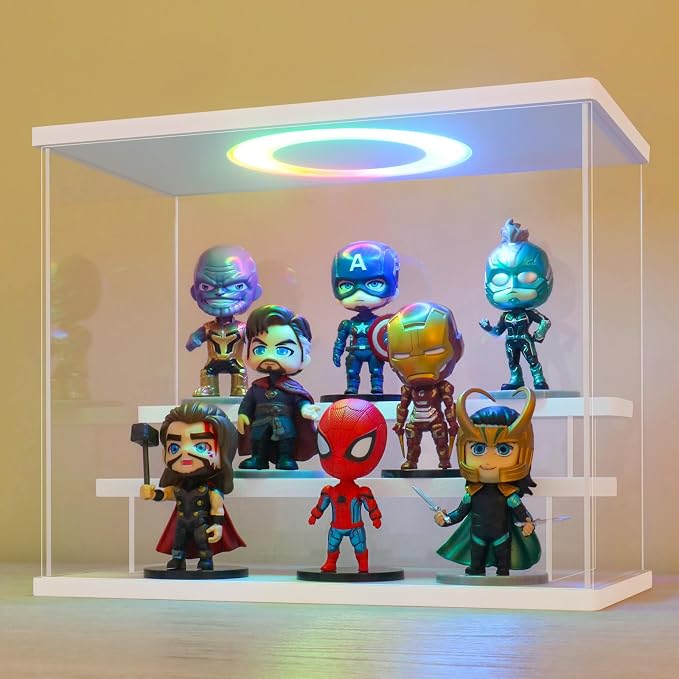 LANSCOERY Acrylic Display Case with RGBW Lights, 3 Tier White | 11.8 x 6.3 x 9.4 in case displays small figures on desks or shelves with tiered rows and front access.