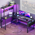 L Shaped Gaming Desk with LED Lights & Power Outlets | Reversible Computer Desk with Storage Shelves & Bag, Large Corner Home Office Desk with Pegboard for Work from Home, Black