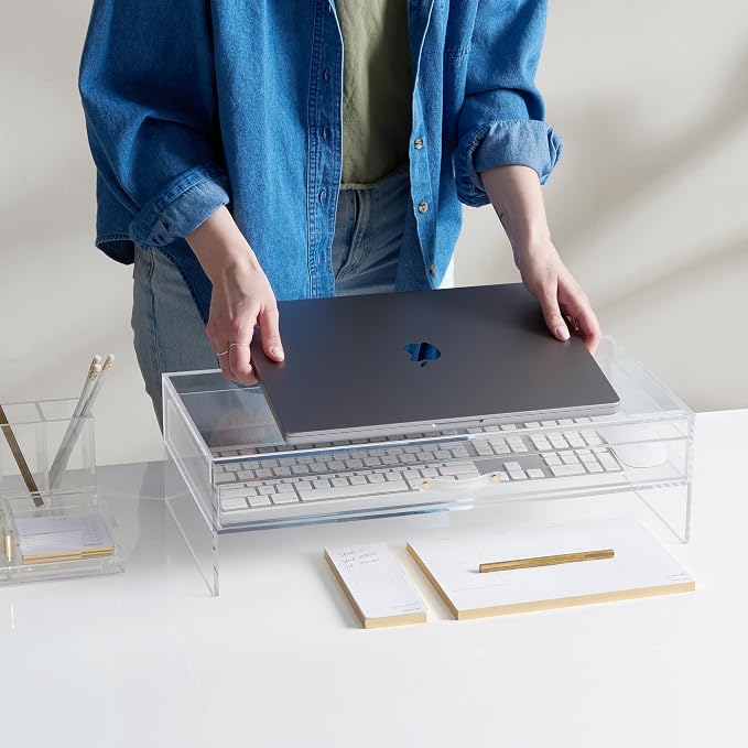 Russell+Hazel Acrylic Monitor Stand with Storage Drawer, Clear | Lifts your monitor for better posture and hides clutter below. Clear acrylic riser with a storage drawer holds up to 10 lbs.