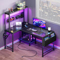 L Shaped Gaming Desk with LED Lights & Power Outlets | Reversible Computer Desk with Storage Shelves & Bag, Small Corner Home Office Desk with Pegboard for Work from Home, Black