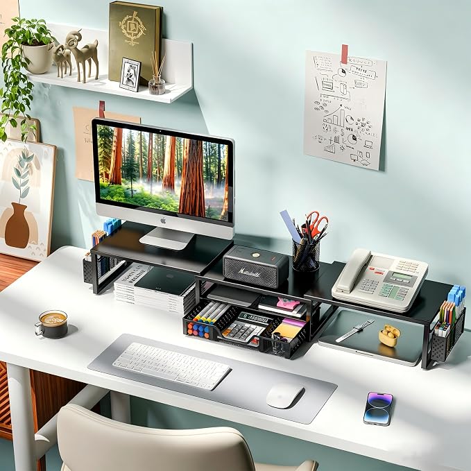 Simple Trending Dual Monitor Stand with Drawer and 2 Pen Holders, Black | 42"L x 9.5"W x 4.75"H. Sturdy metal. Fits 2 monitors. Reduces neck strain. Drawer + 2 pen holders. Easy assembly. 24h support